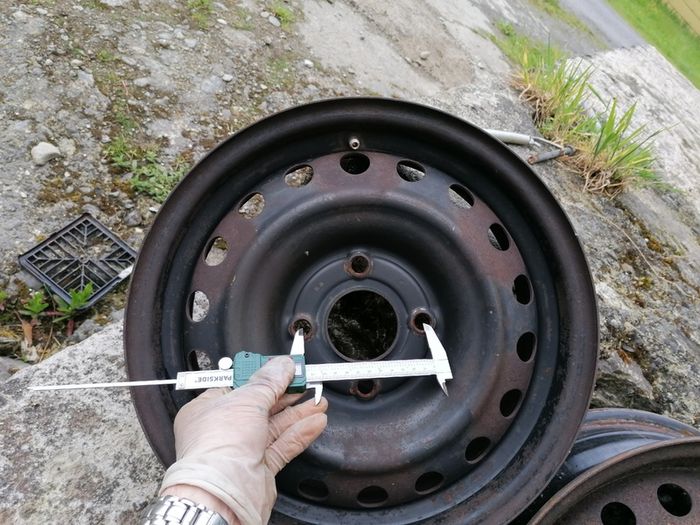 2 x steel rims 15", 4 stud, about 114mm ish from hole centre to the opposite home centre... Possibly fit a nissan etc