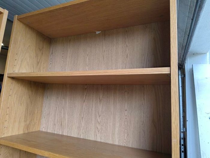 Two oak Ikea Billy Bookcases