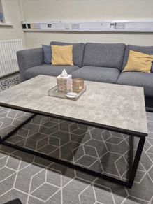 Concrete-effect coffee table with black metal frame