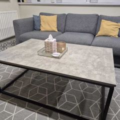 Concrete-effect coffee table with black metal frame