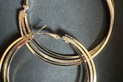 Stylish gold-tone earrings in excellent/new condition.