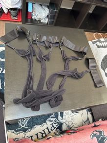 Two pair of suspender tights