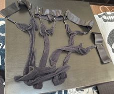 Two pair of suspender tights