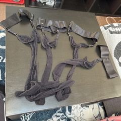 Two pair of suspender tights