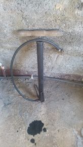 very old manual bicycle pump