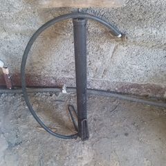 very old manual bicycle pump