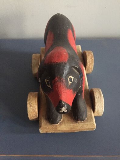 vintage wooden dog on wheels