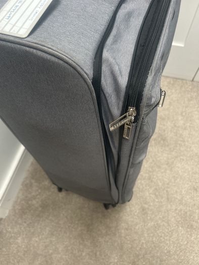 Free big grey suitcase