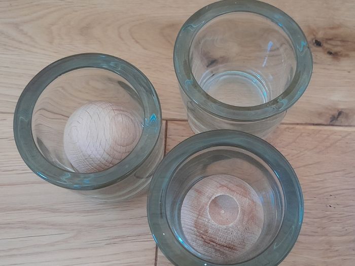 3 glasses and 2 wooden diffuser balls