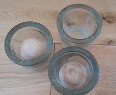 3 glasses and 2 wooden diffuser balls