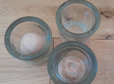 3 glasses and 2 wooden diffuser balls