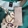 Brand-New Green Floral Dress with Short Sleeves Size Medium UK 10 / EU 38 Image 2