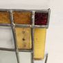 Vintage leaded glass with curved brass screen . Image 9