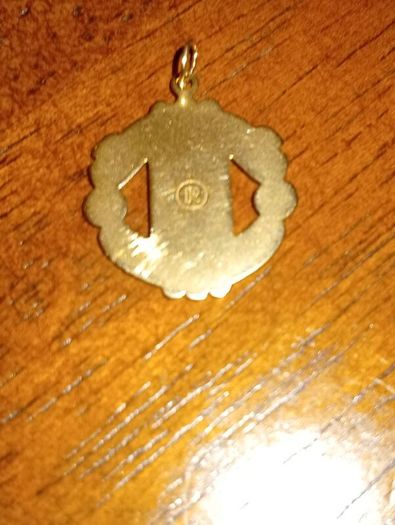 Gold pendant Manchester United
