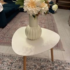Side table with flowers and pot
