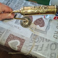 A Beautiful 20th Century Brass Adjustable Light, the cylindrical shade applied with a relief, on a curved arm rising from a foliage-cast wall mounts, Postage Available or Collection