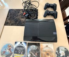 PS3 Console + 2 DualShock controllers + 6 games