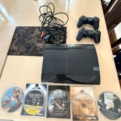 PS3 Console + 2 DualShock controllers + 6 games