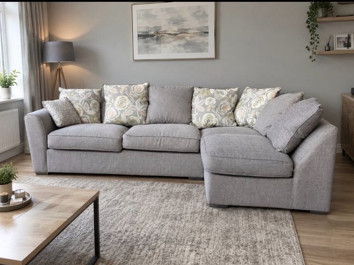 Grey Harvey norman corner sofa with matching footstool
