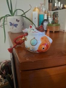 cat figurines x2