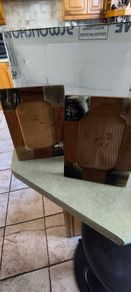 Set of 2 photo frame decorated with a patchwork of wood and horn veneers. 4 x 6  inches