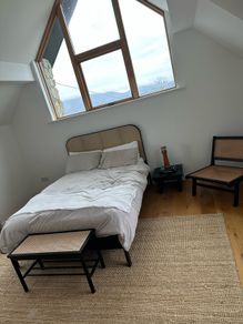 rattan bed frame with mattress and bench