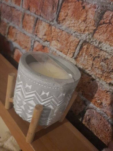 lovely candle on wooden stand
