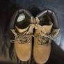 pair of tan/wheat leather boots with a padded dark brown collar. Image 3