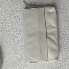Taurus leather clutch bag