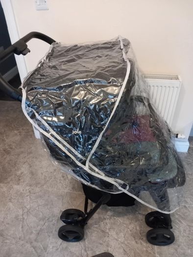 Joie double baby's buggie with rain covers
