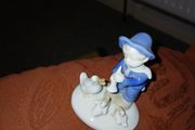 Figurine of a young Boy, 3 ducks