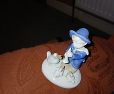 Figurine of a young Boy, 3 ducks