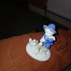 Figurine of a young Boy, 3 ducks