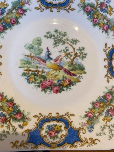 Six mismatched pretty plates/dishes