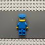 lego simpsons sim023 Chief Wiggum minifigure with Dark Pink Frosting Splotches on Face and Shirt Image 2