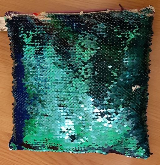 Sequinned unicorn cushion