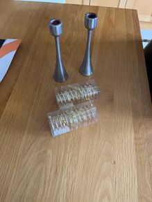 4 napkin holders (new) and 2 used candlesticks