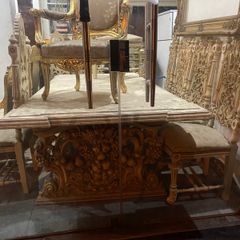 Old heavy carved wood table and chairs...