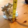 Beautiful porcelain baby in a flower Image 2