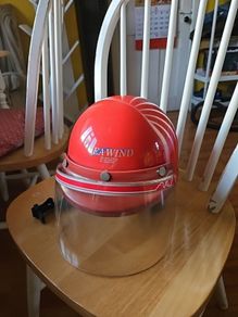 Vintage and quirky Suzuki safety helmet with visor.