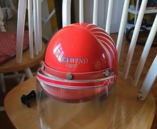 Vintage and quirky Suzuki safety helmet with visor.