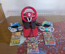 Super Mario Nintendo switch pack - 3 games, 2 pro controllers and a steering wheel