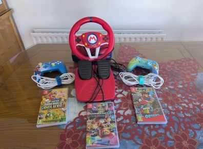 Super Mario Nintendo switch pack - 3 games, 2 pro controllers and a steering wheel