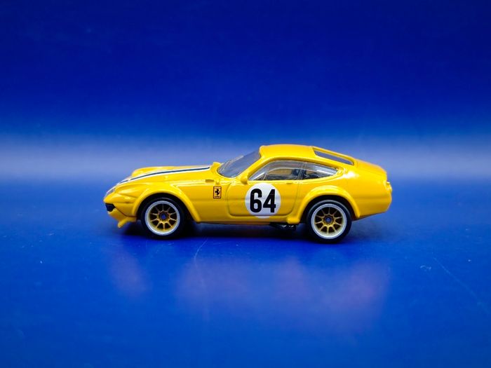 Hot Wheels Ferrari 365 GTB4 C with custom wheels.