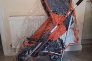 Dimples baby's buggie with rain cover