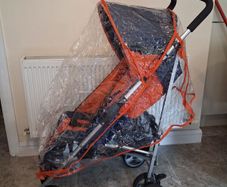 Dimples baby's buggie with rain cover