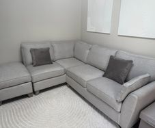 Corner group sofa with chaise and footstool