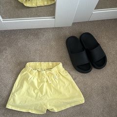 Yellow Zara shorts with free sliders