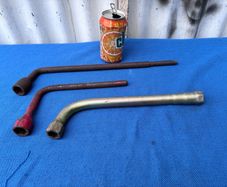 3 vintage wheel braces