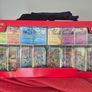 Pokemon Prismatic Evolutions Costco 8 Mini Tin Display Image 2